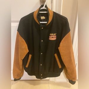 Vintage Bauer varsity jacket with genuine suede sleeves.
